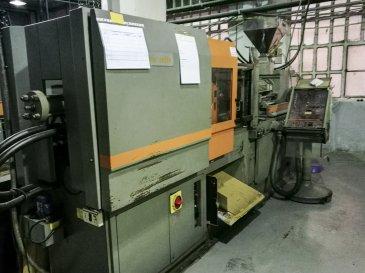 Links zicht  van SANDRETTO S.7/95 machine